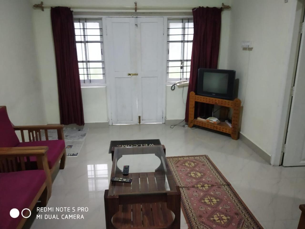 Munnar Heritage Bungalow Kültér fotó
